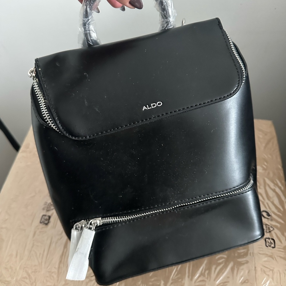 Aldo Black Leather Backpack with Silver Accents